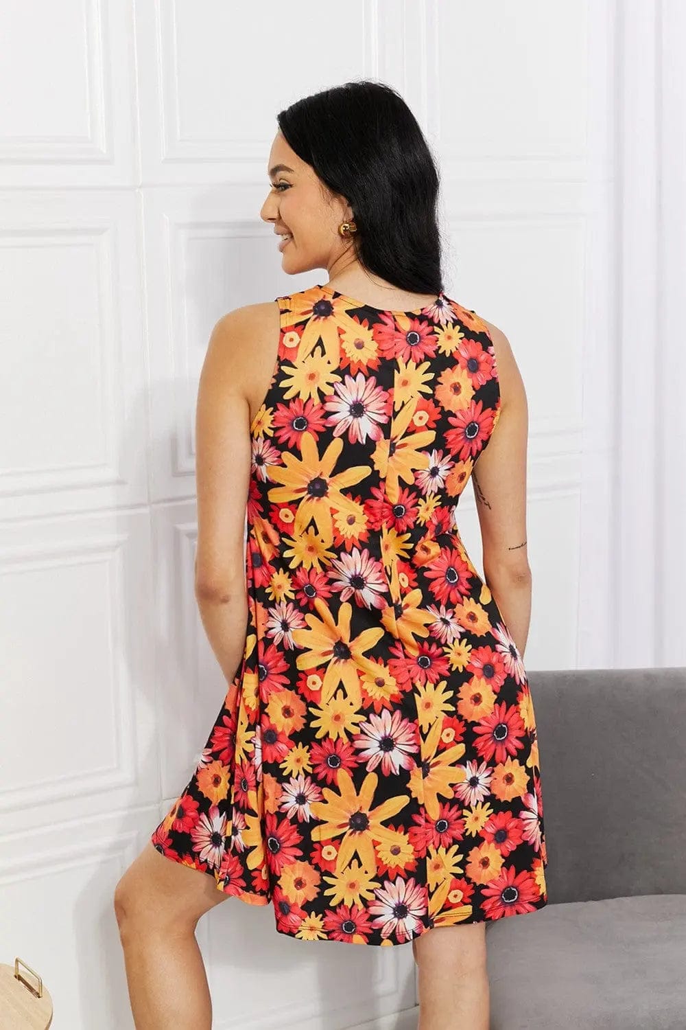 Yelete Full Size Floral Sleeveless Dress with Pockets  31.00 MPGD Corp Merchandise